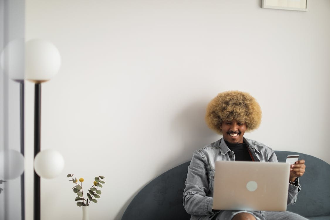 Man buying online with his credit card